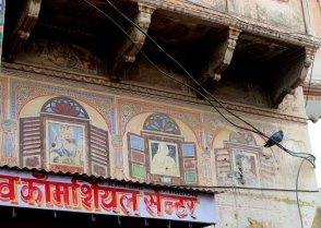 Quirky fresco painted over a shop front in the Nawalgarh Market