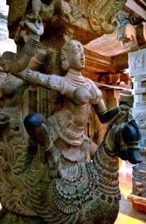 Rathi, the consort of Madana or Kamadeva, the God of Love. Look at her grace, the movement and the fluidity of the sensuous sculpture